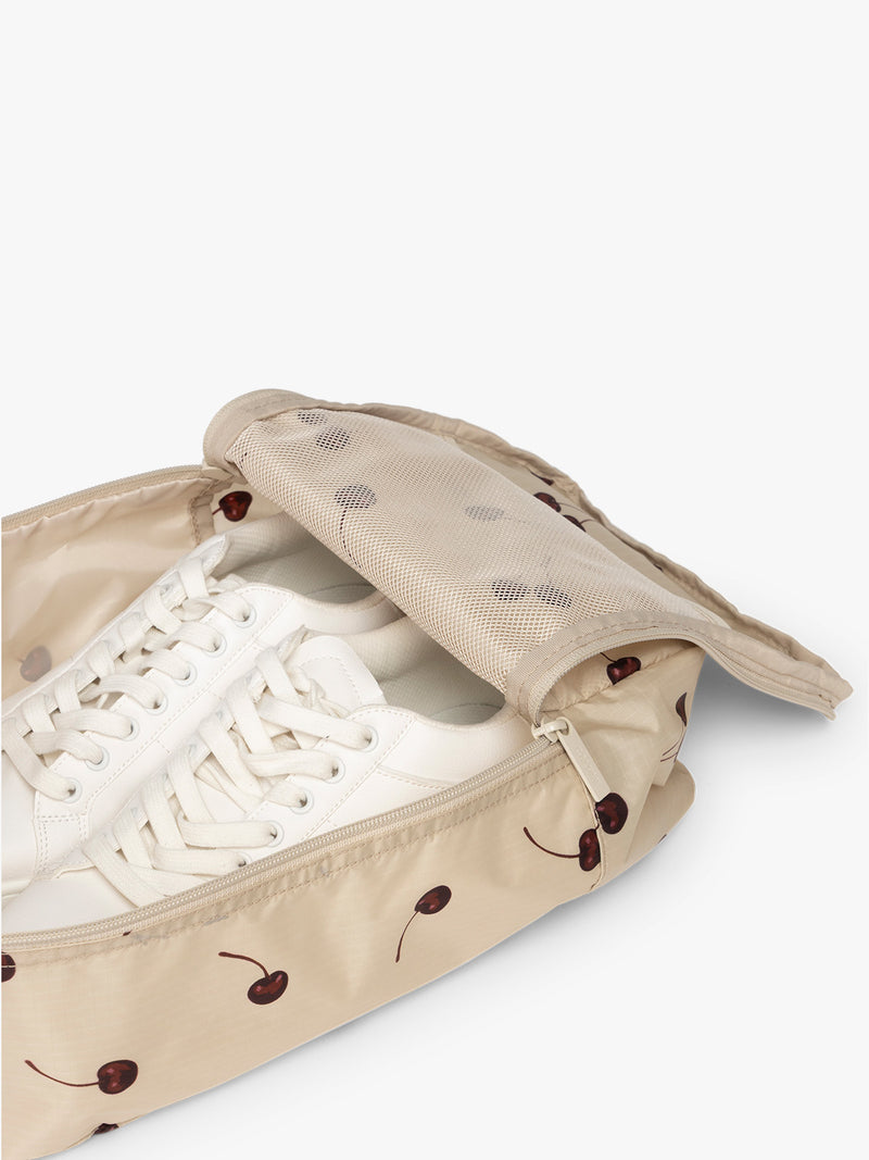 Shoe inside CALPAK Shoe Cubes oatmeal with cherry print