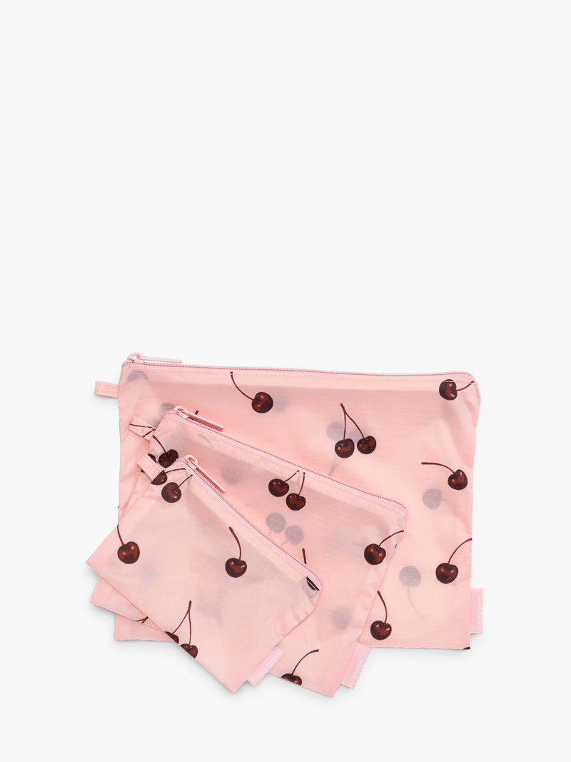 CALPAK  Compakt Zippered Pouch in pink with cherry pattern