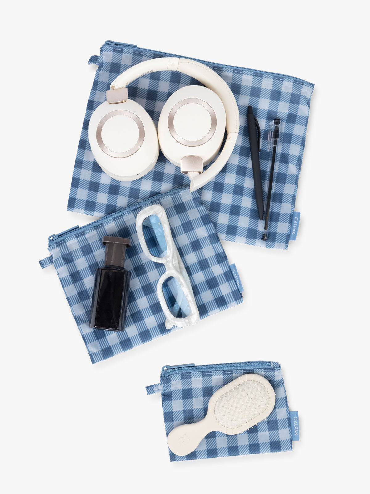 Items that fit into the CALPAK Compakt Zip Pouch Set in white and blue gingham print French Blue Gingham; KZB2001-FRENCH-BLUE-GINGHAM