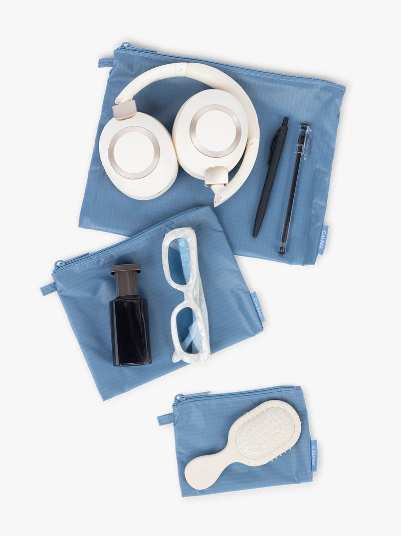 Items that can fit into the CALPAK Compakt Zip Pouch Set in lube French Blue