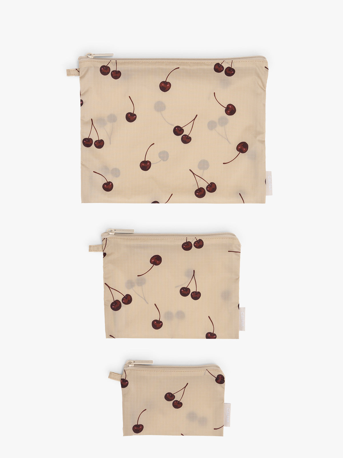 CALPAK  Compakt Zippered Pouch in beige with cherry pattern laid out; KZB2001-OATMEAL-CHERRY