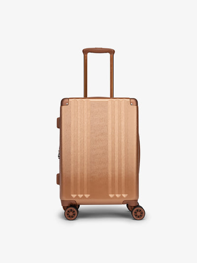 Front-facing image of CALPAK Ambeur carry-on luggage with 360 spinner wheels in copper; model LAM1020-COPPER