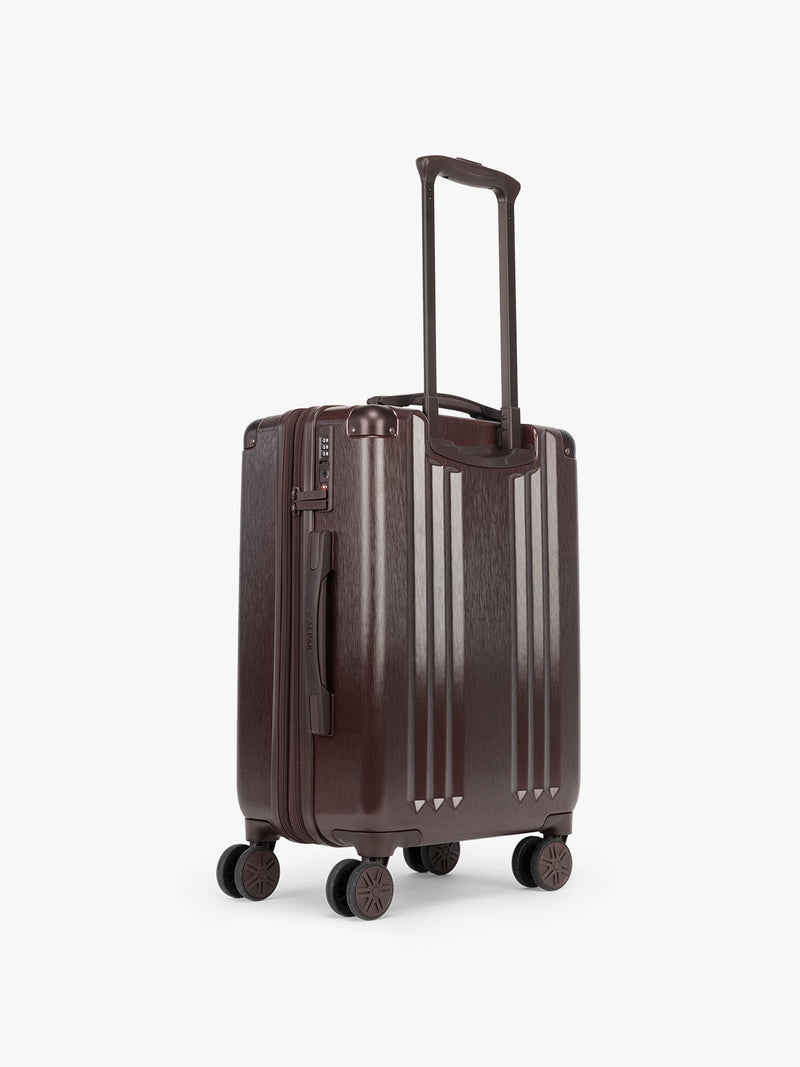 Backside of CALPAK Ambeur Carry On Luggage in brown Walnut with metallic look