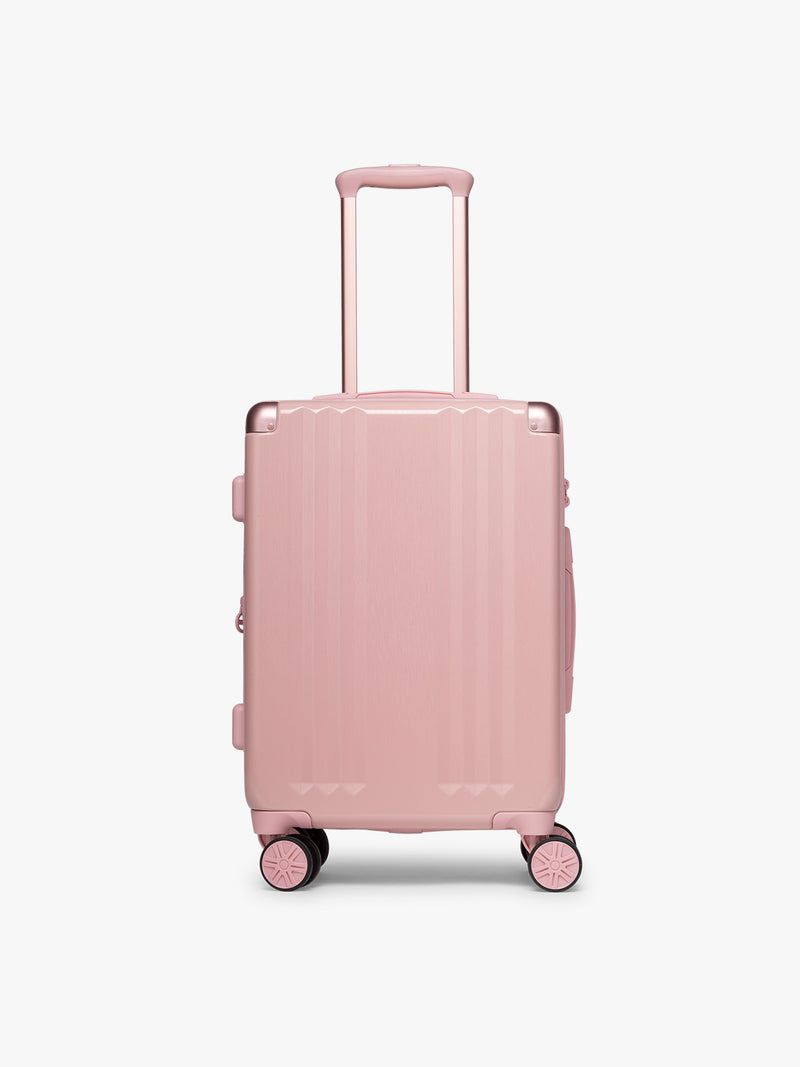 CALPAK Ambeur Carry-On Luggage in metallic pink Blossom with pink wheels