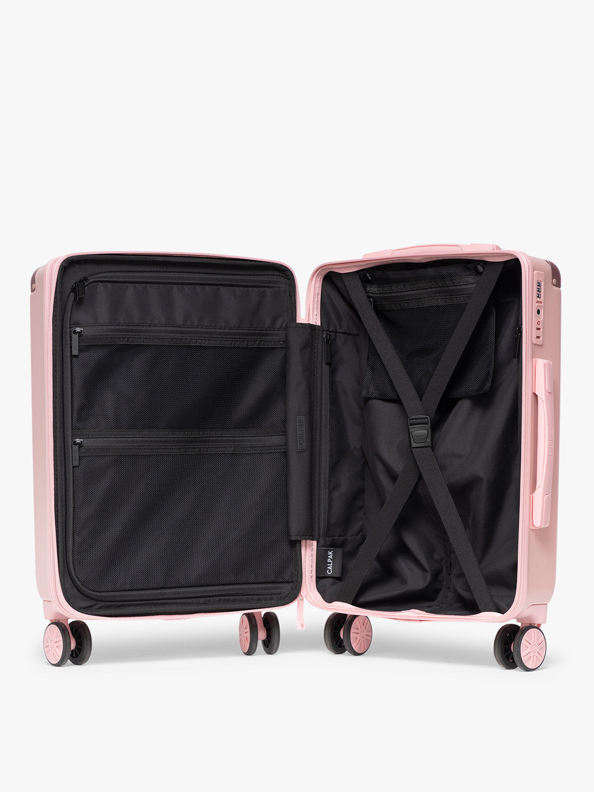 Opened view of CALPAK 2pc Ambeur Luggage Set featuring the Ambeur Carry-On Luggage and Ambeur Large Luggage in metallic pink Blossom with pink wheels;  LAM2000-BLOSSOM