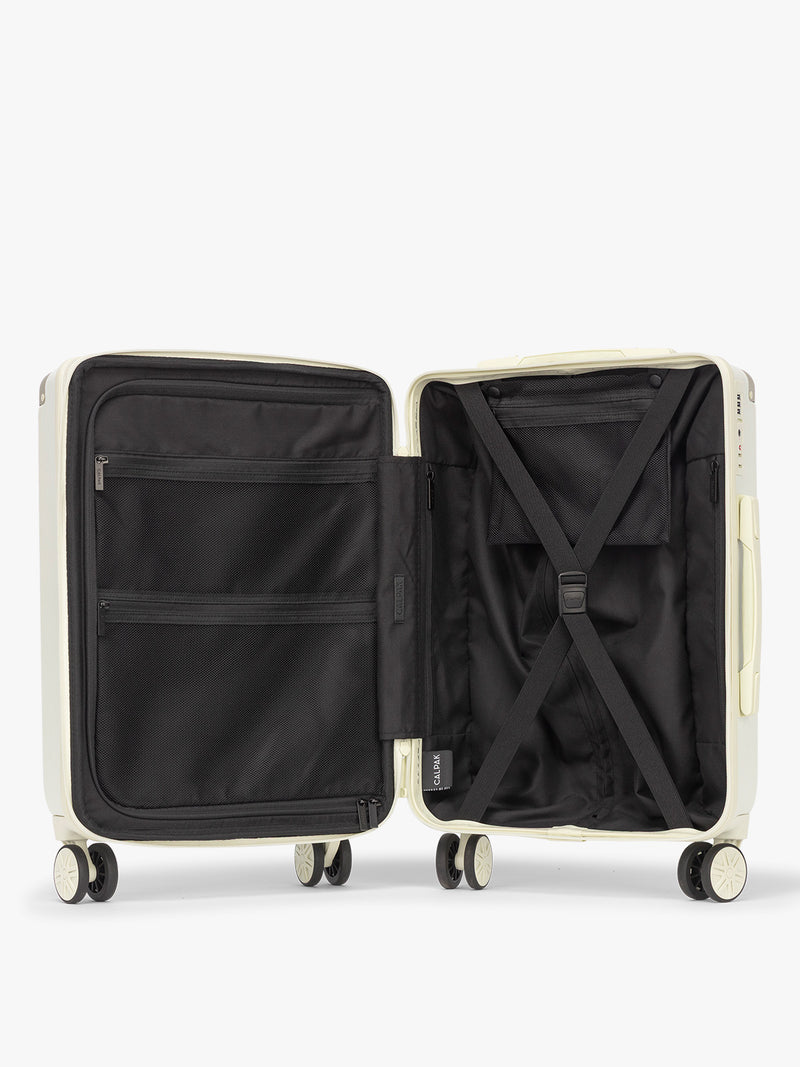 Opened view of CALPAK Ambeur 2 piece Luggage Set in light green Celadon
