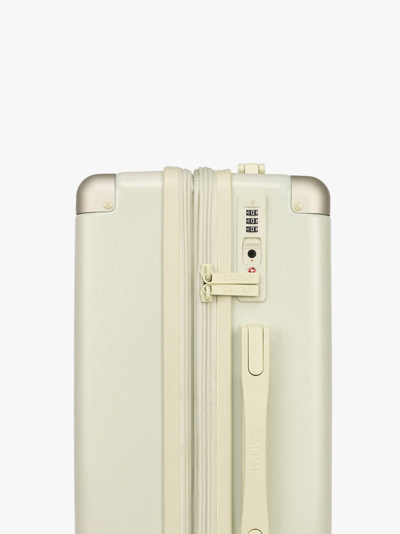 TSA Lock of CALPAK Ambeur 3 piece Luggage Set in light green Celadon with sizes of Carry On, Medium, and Large