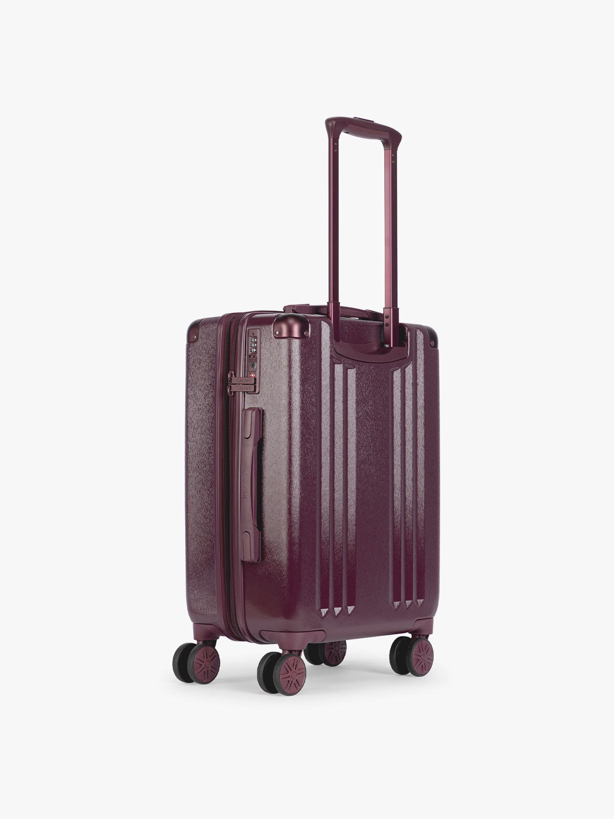 Back view of CALPAK Dark Cherry burgundy Ambeur Carry On  hard-shell suitcase with a telescoping handle extended, shown from the front against a plain white background; LAM1020-DARK-CHERRY