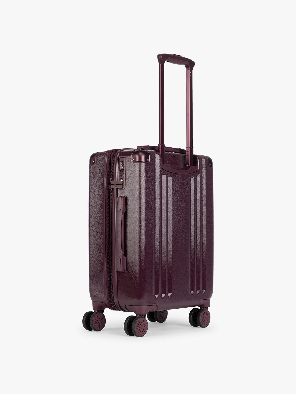 Back view of CALPAK Dark Cherry burgundy Ambeur Carry On  hard-shell suitcase with a telescoping handle extended, shown from the front against a plain white background; LAM1020-DARK-CHERRY