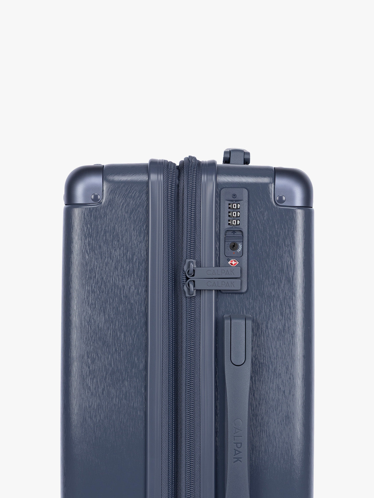 TSA lock of Carry On of the CALPAK Ambeur 2pc Luggage in dark blue Metallic Indigo ; LAM2000-INDIGO