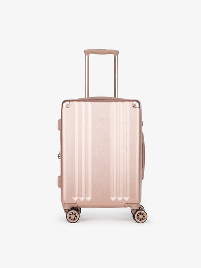 Lightweight rose gold CALPAK Ambeur 22-inch rolling spinner carry-on luggage; model LAM1020-ROSE-GOLD