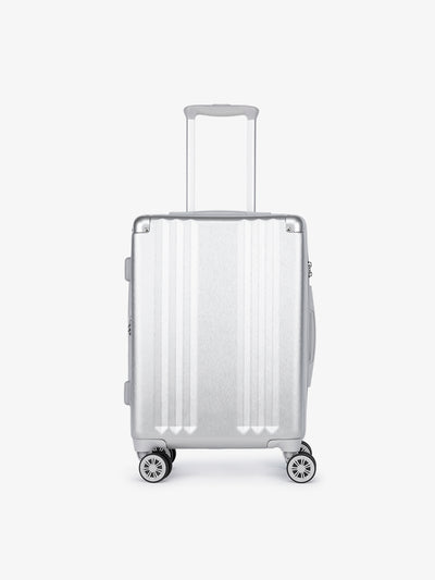 Studio product shot of front-facing lightweight silver CALPAK Ambeur 22-inch hardside rolling spinner carry-on luggage; model LAM1020-SILVER
