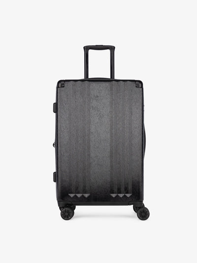 Studio product shot of front-facing CALPAK Ambeur black medium 26-inch lightweight hardshell rolling luggage; model LAM1024-BLACK