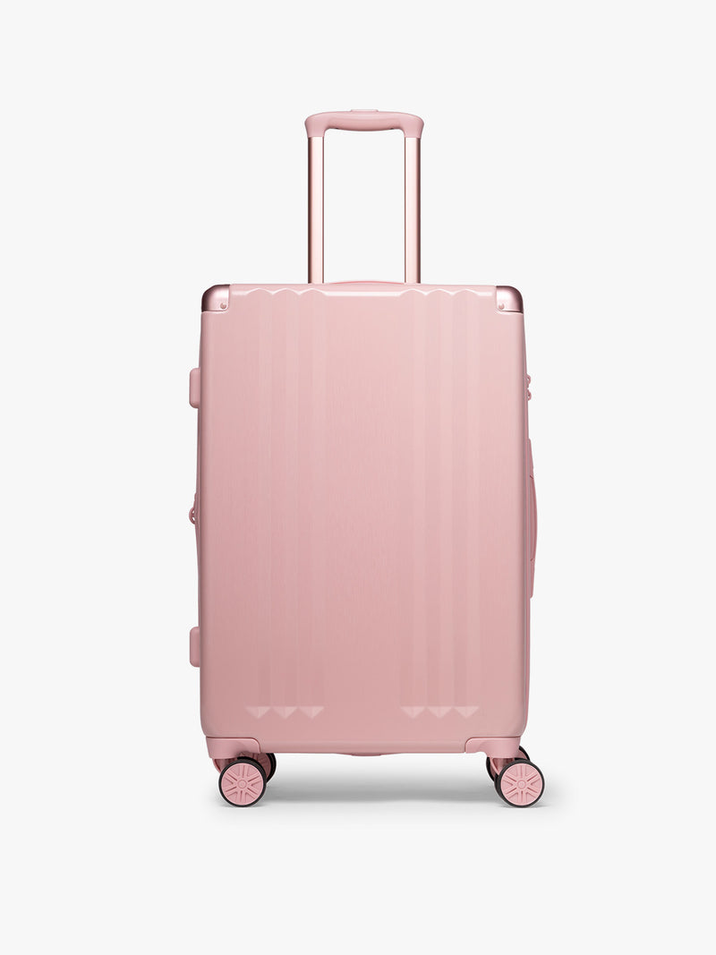 CALPAK Ambeur Medium Luggage in metallic pink Blossom with pink wheels