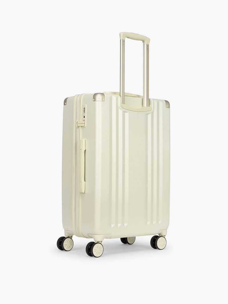 Backside of CALPAK Ambeur Medium Luggage in light green Celadon