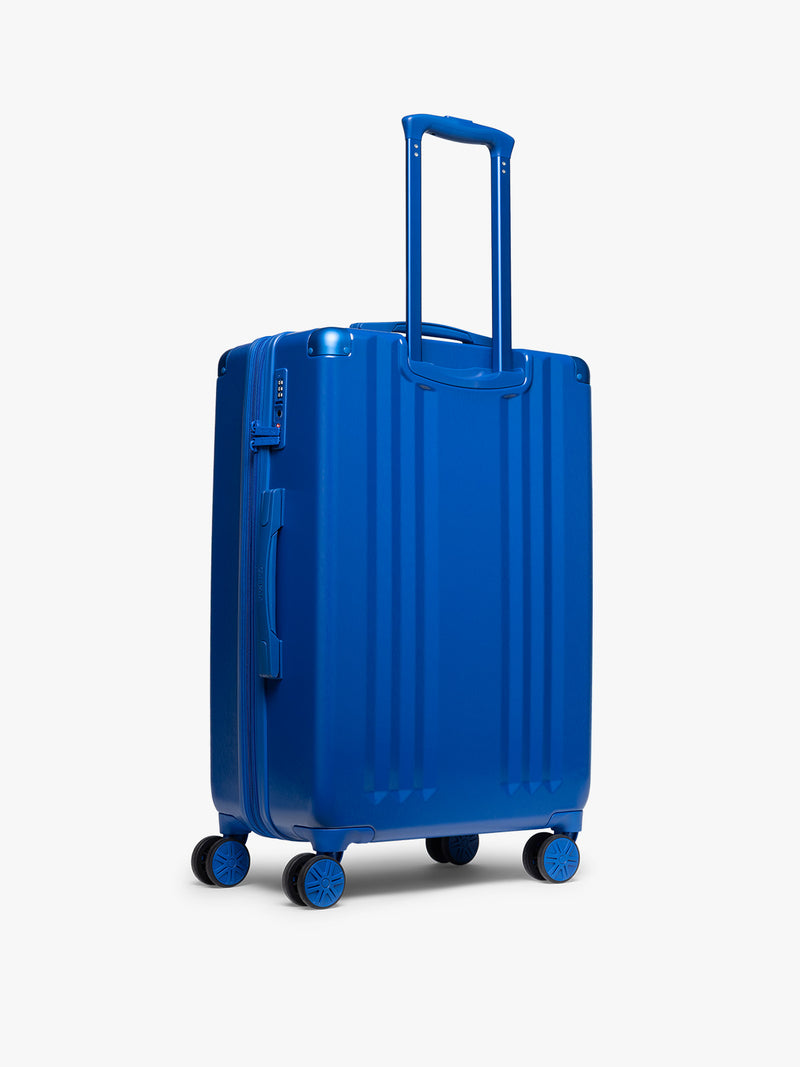 CALPAK Ambeur Medium Luggage back view in dark blue Cobalt