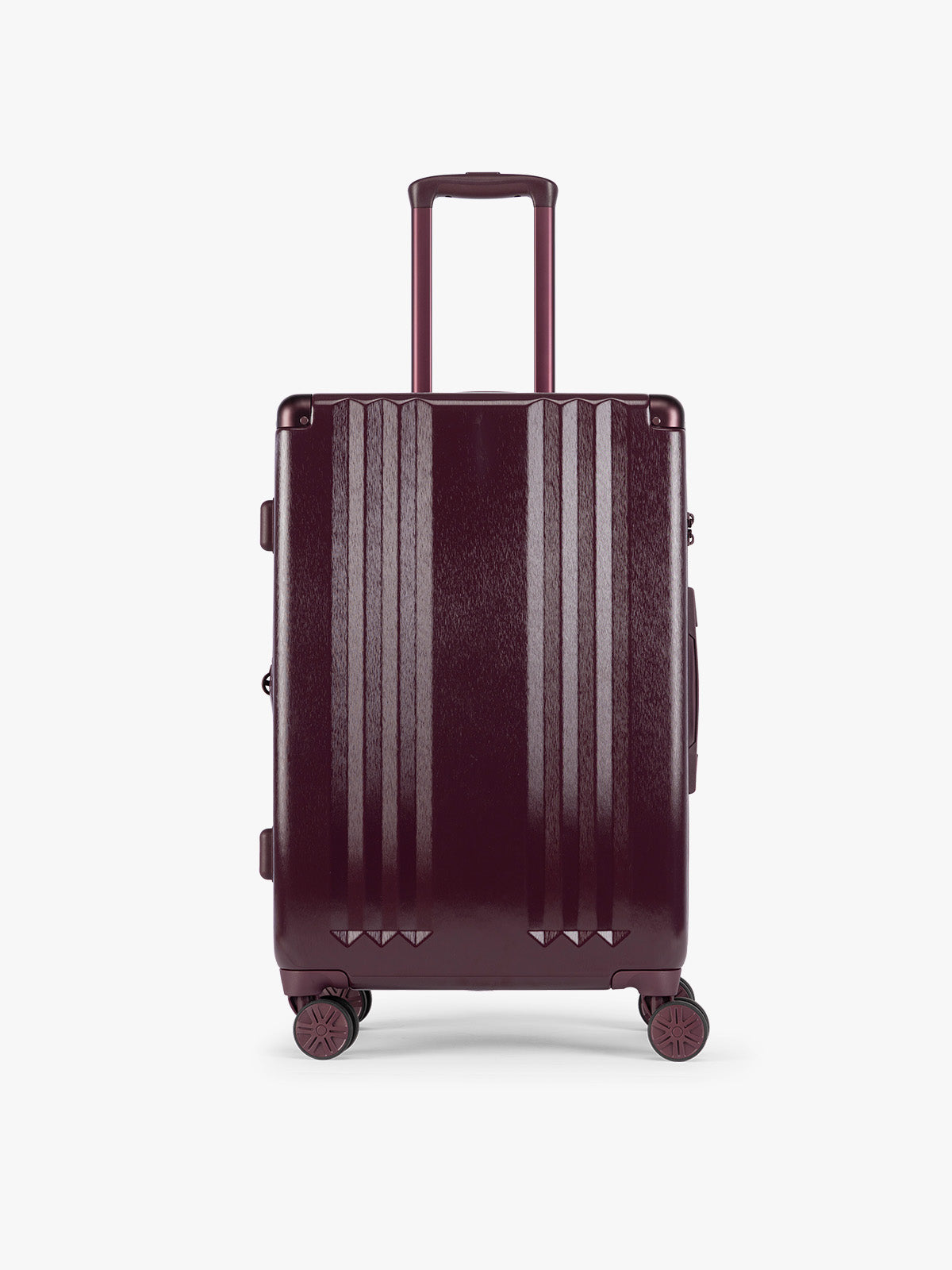CALPAK Ambeur Medium Luggage in dark burgundy Dark Cherry with vertical ribbed detailing and an extended telescoping handle, shown from the front against a plain white background; LAM1024-DARK-CHERRY