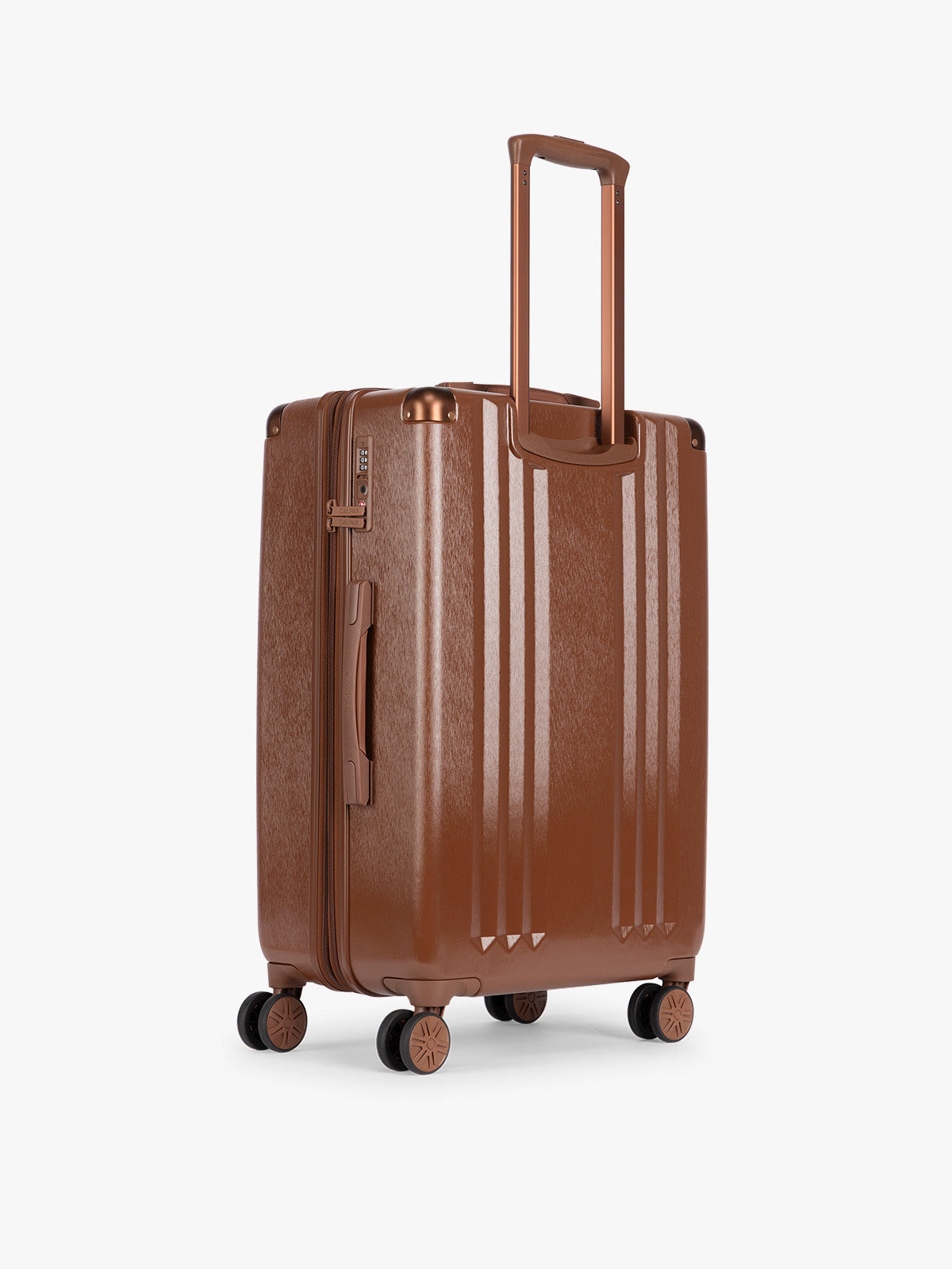 Back view of CALPAK Ambeur Medium Luggage in light Honey Brown with vertical ribbed detailing and an extended telescoping handle, shown from the front against a plain white background; LAM1024-HONEY-BROWN