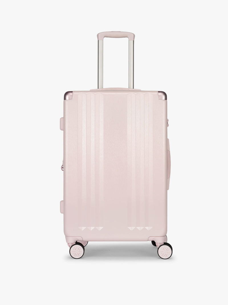 CALPAK Ambeur Medium Luggage in light pink Shell Pink with handles and wheels