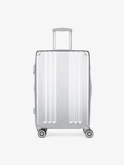Studio product shot of front-facing CALPAK Ambeur silver medium 26-inch lightweight hardshell rolling luggage; model LAM1024-SILVER