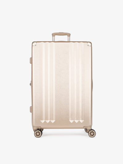 CALPAK Ambeur large 30-inch gold hardshell spinner luggage; model LAM1028-GOLD