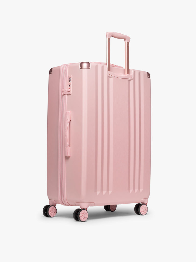 Back view of CALPAK Ambeur Large Luggage in light pink Blossom