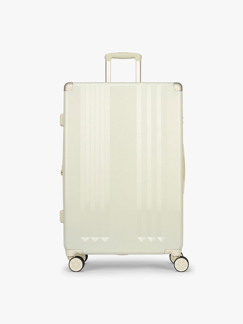 CALPAK Ambeur 3 piece Luggage Set in light green Celadon with sizes of Carry On, Medium, and Large