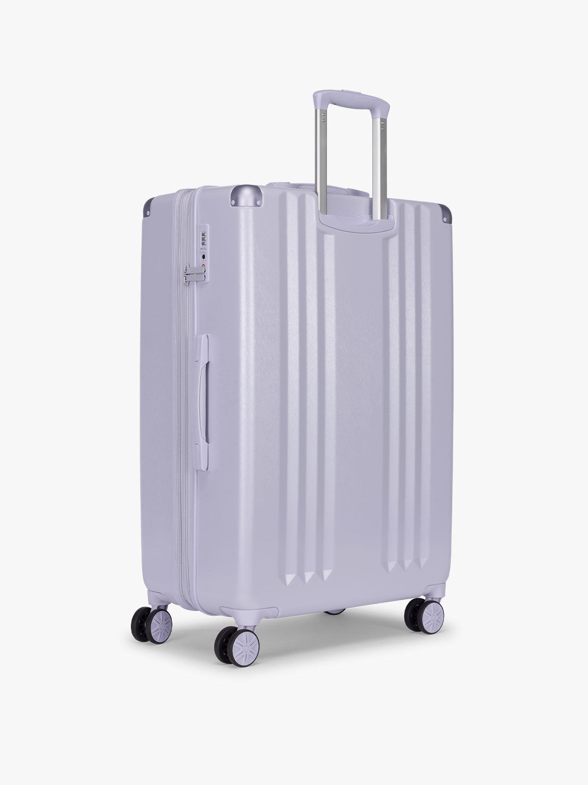 Backside of CALPAK Ambeur Large Luggage in light lavender purple with handles and spinner wheels on a white background; LAM1028-SEA-GLASS