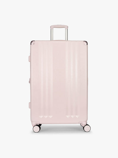 CALPAK Ambeur Large Luggage in light pink in Shell Pink with handles and spinner wheels; LAM1028-SHELL-PINK view 1