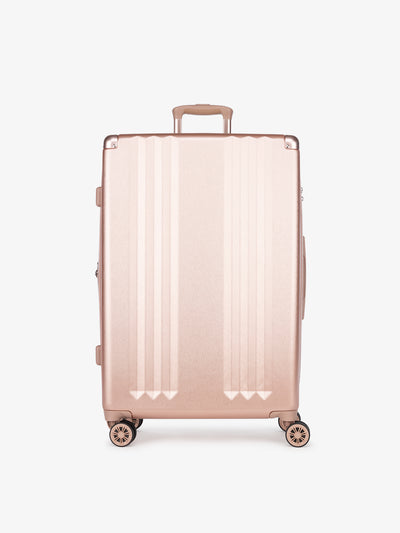 CALPAK Ambeur large 30-inch pink rose gold hardshell spinner luggage; model LAM1028-ROSE-GOLD