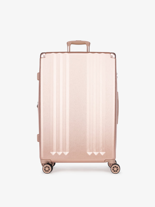 CALPAK Ambeur large 30-inch pink rose gold hardshell spinner luggage