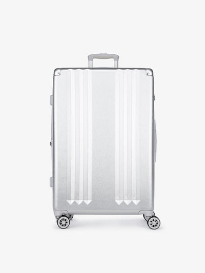 Studio product shot of front-facing CALPAK Ambeur large 30-inch silver hardshell spinner luggage; LAM1028-SILVER
