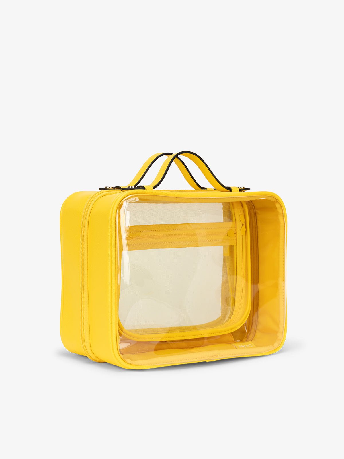 CALPAK large clear skincare bag with multiple zippered compartments in yellow