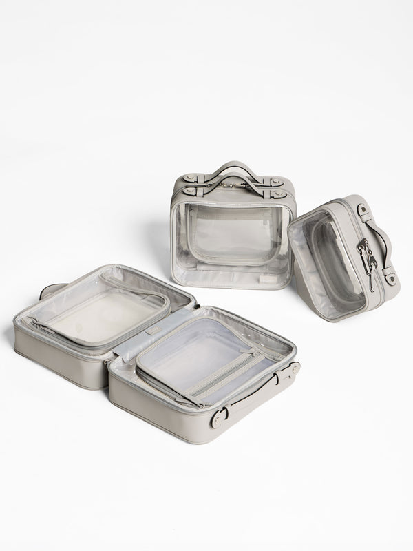 CALPAK Clear Cosmetics Cases in small, medium and large in cool grey