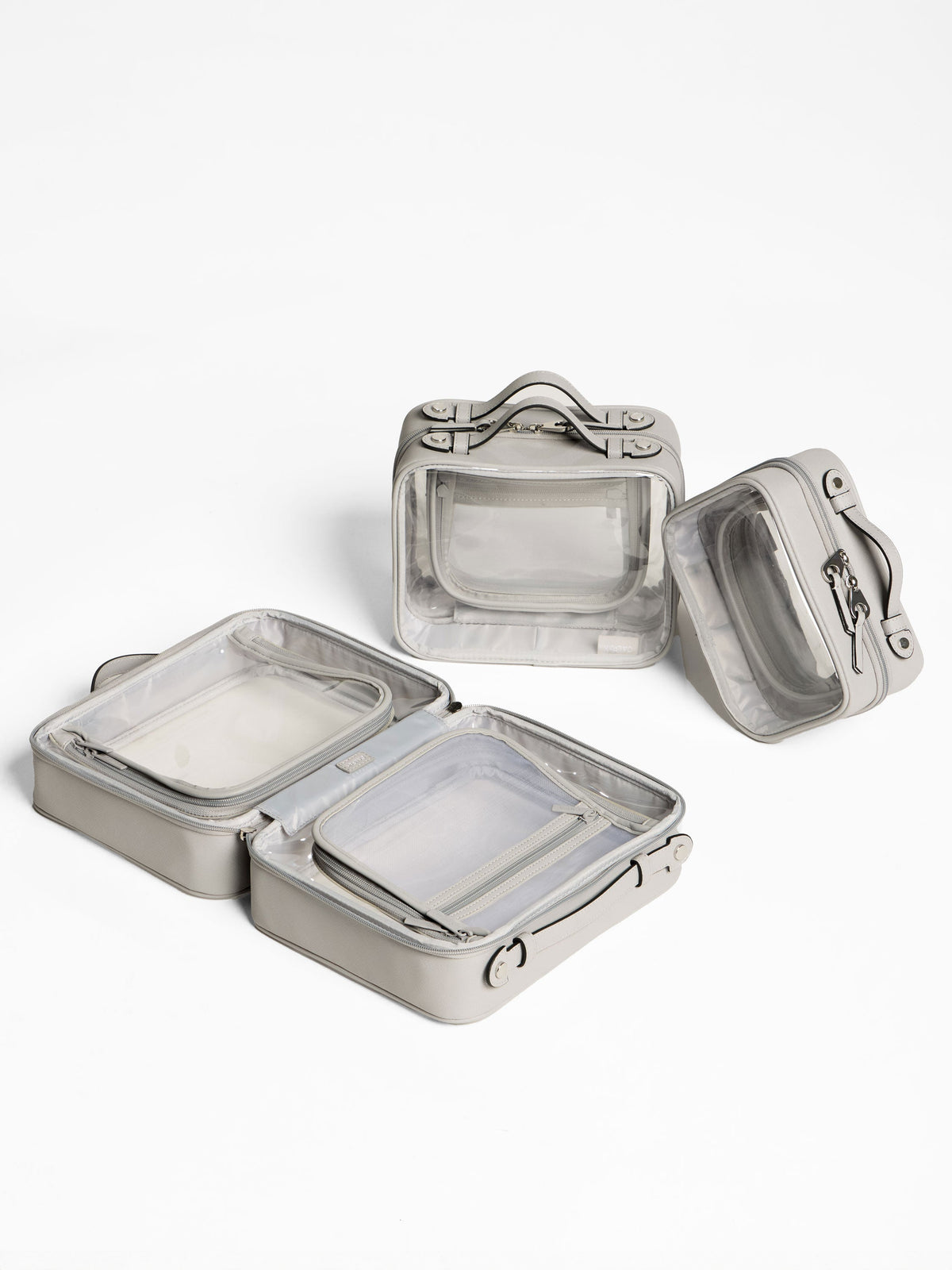 CALPAK Clear Cosmetics Cases in small, medium and large in cool grey; CCC2001-COOL-GREY