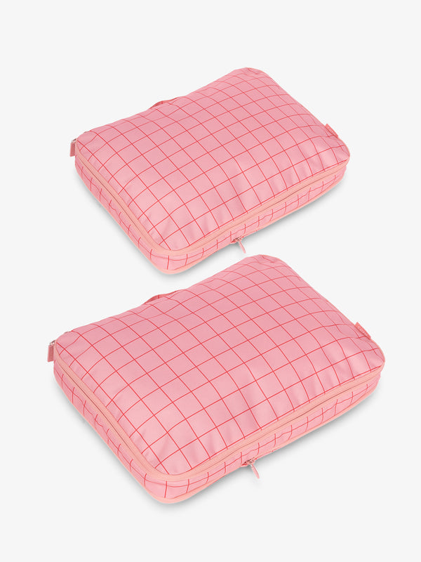 CALPAK Large Compression Packing Cubes in pink and red grid print