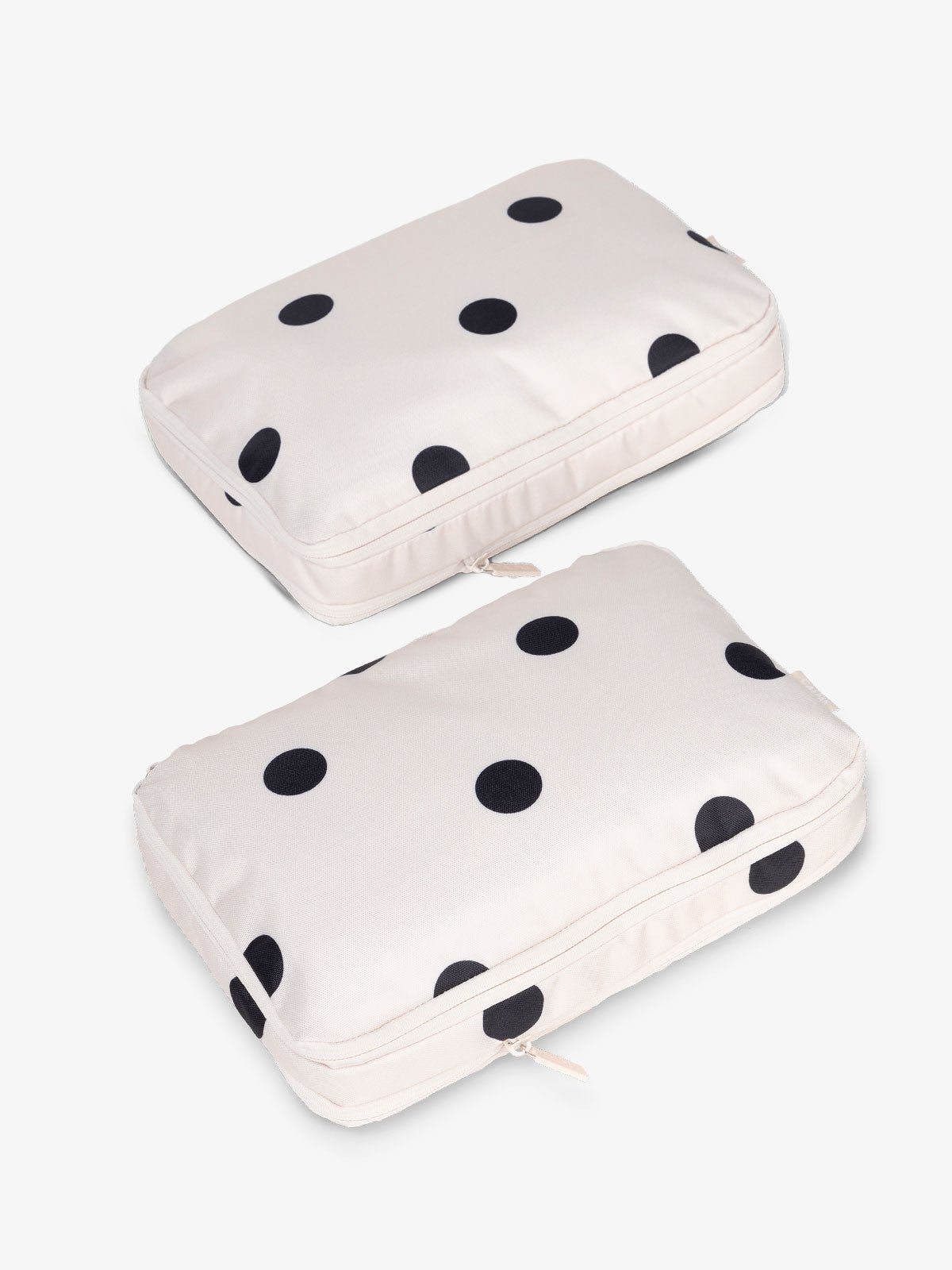 CALPAK Large Compression Packing Cubes in black and white polka dot
