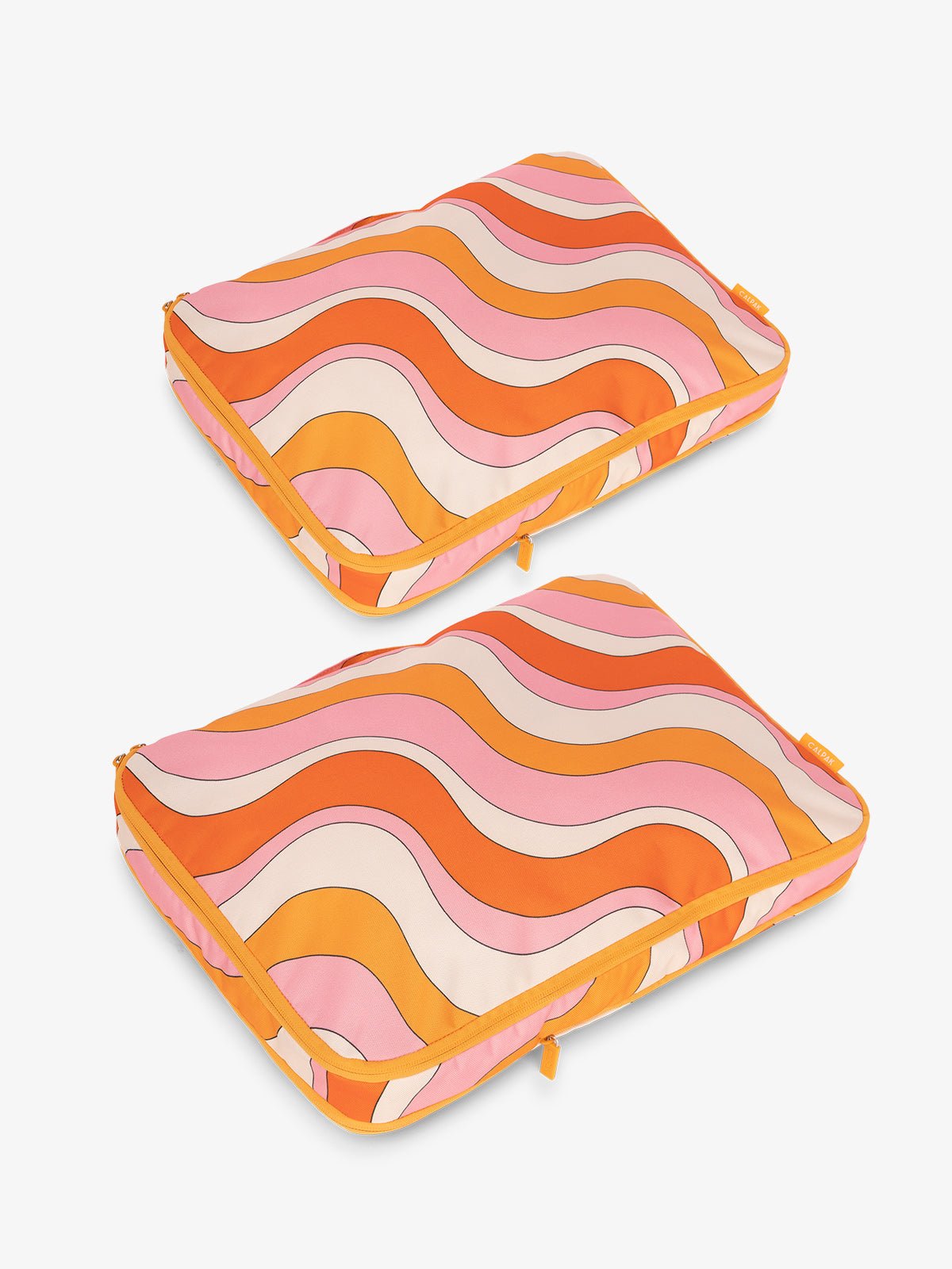 CALPAK Large Compression Packing Cubes in orange and pink wavy print