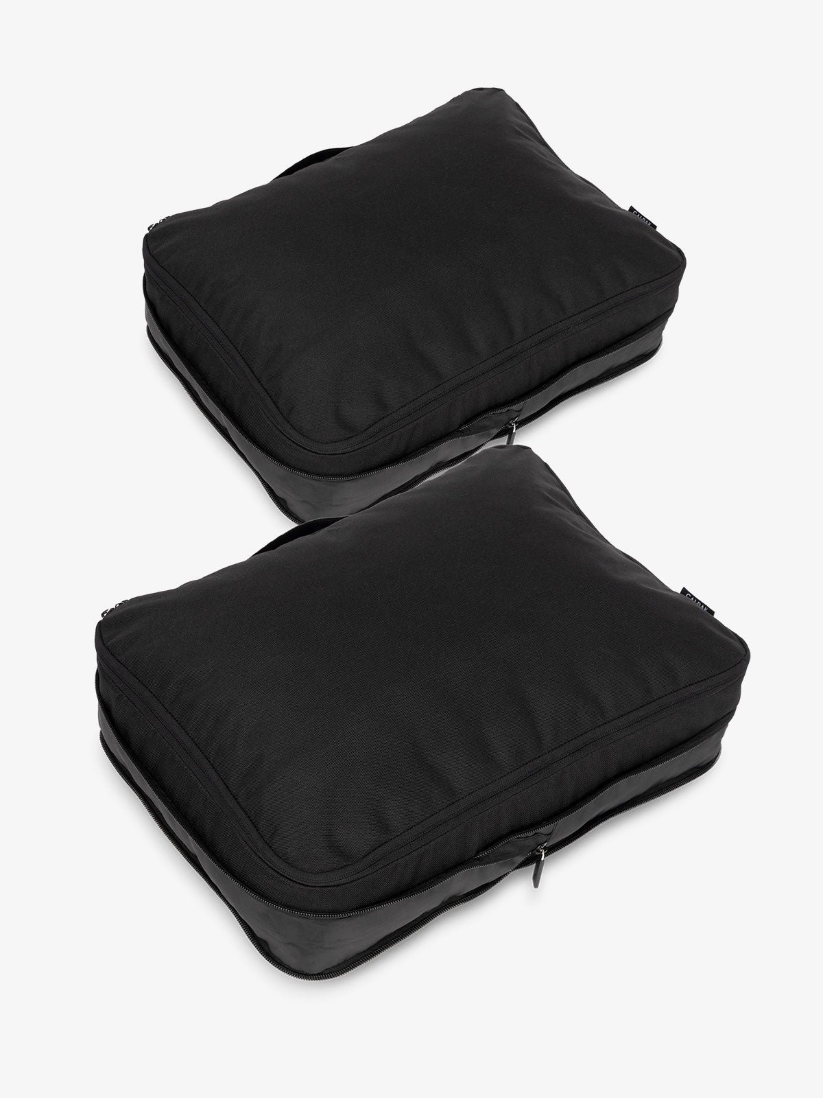 CALPAK large packing cubes with top handles and expandable by 4.5 inches in black