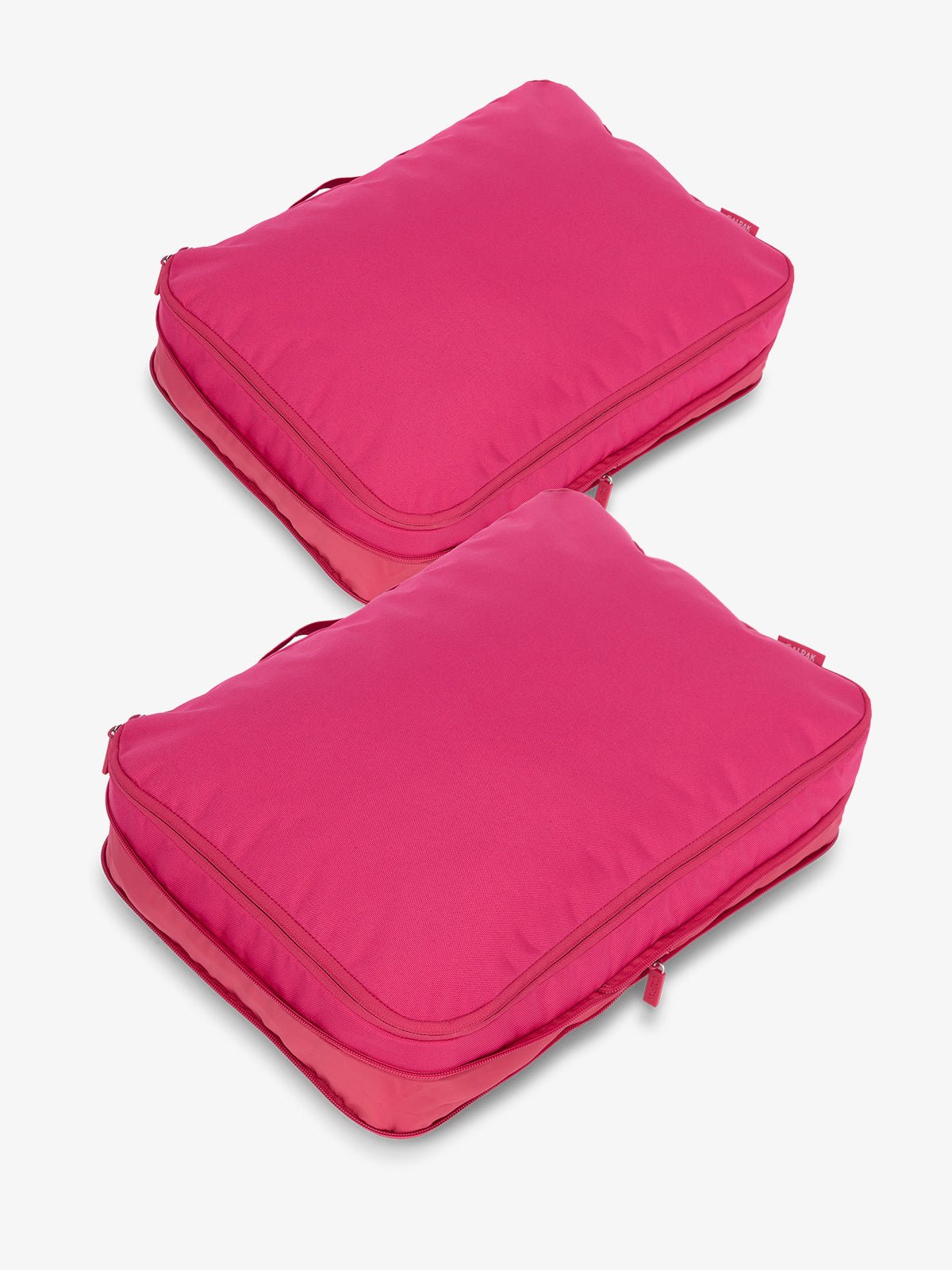 CALPAK large packing cubes with top handles and expandable by 4.5 inches in dragonfruit pink