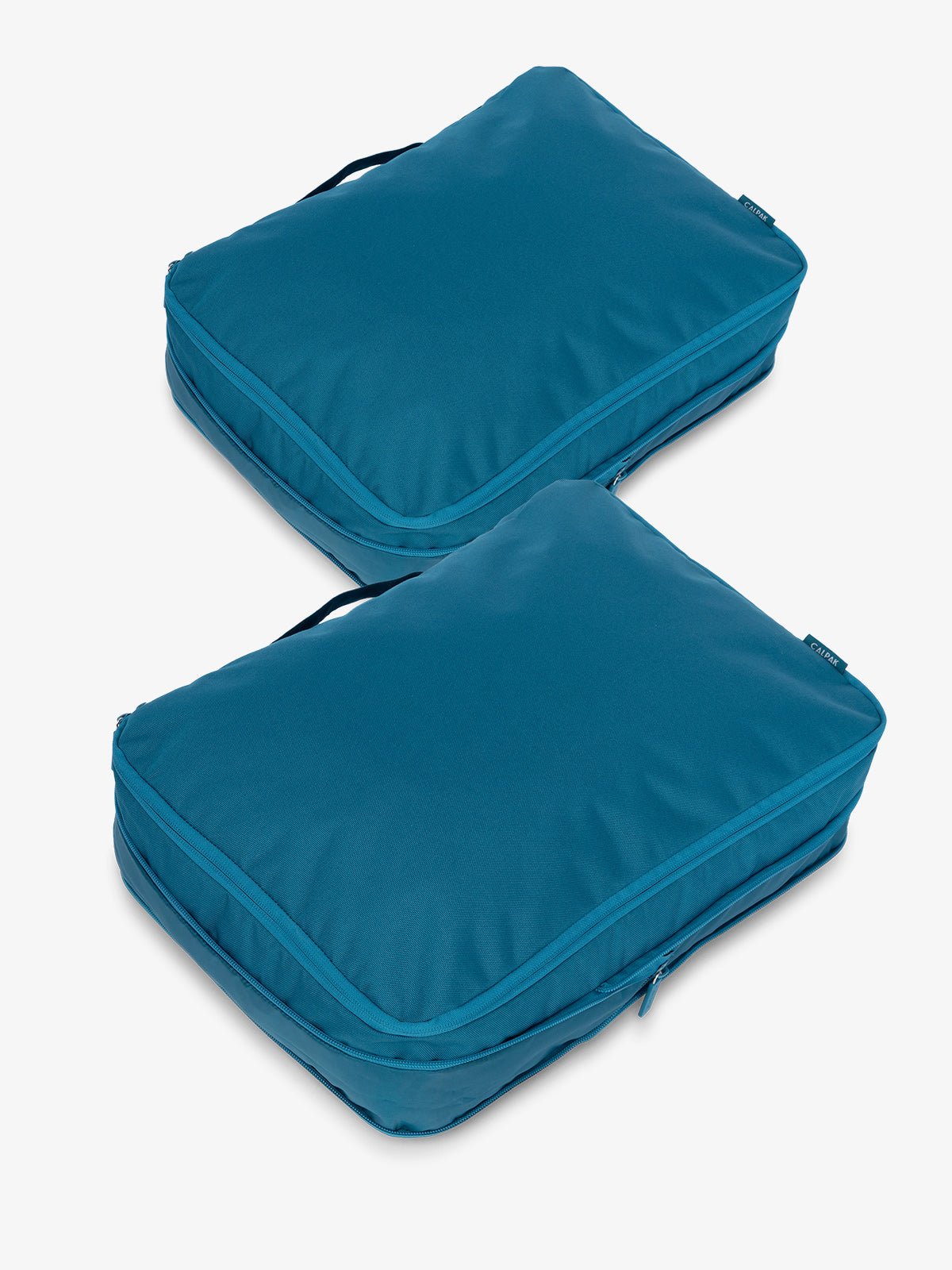 CALPAK large packing cubes with top handles and expandable by 4.5 inches in lagoon blue