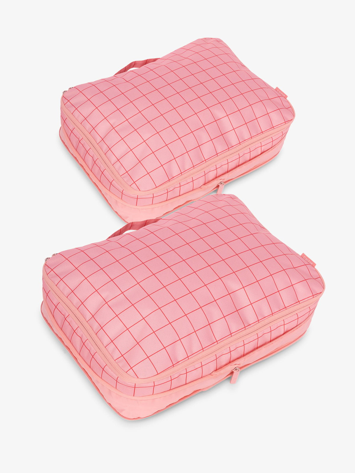 CALPAK large packing cubes with top handles and expandable by 4.5 inches in pink grid