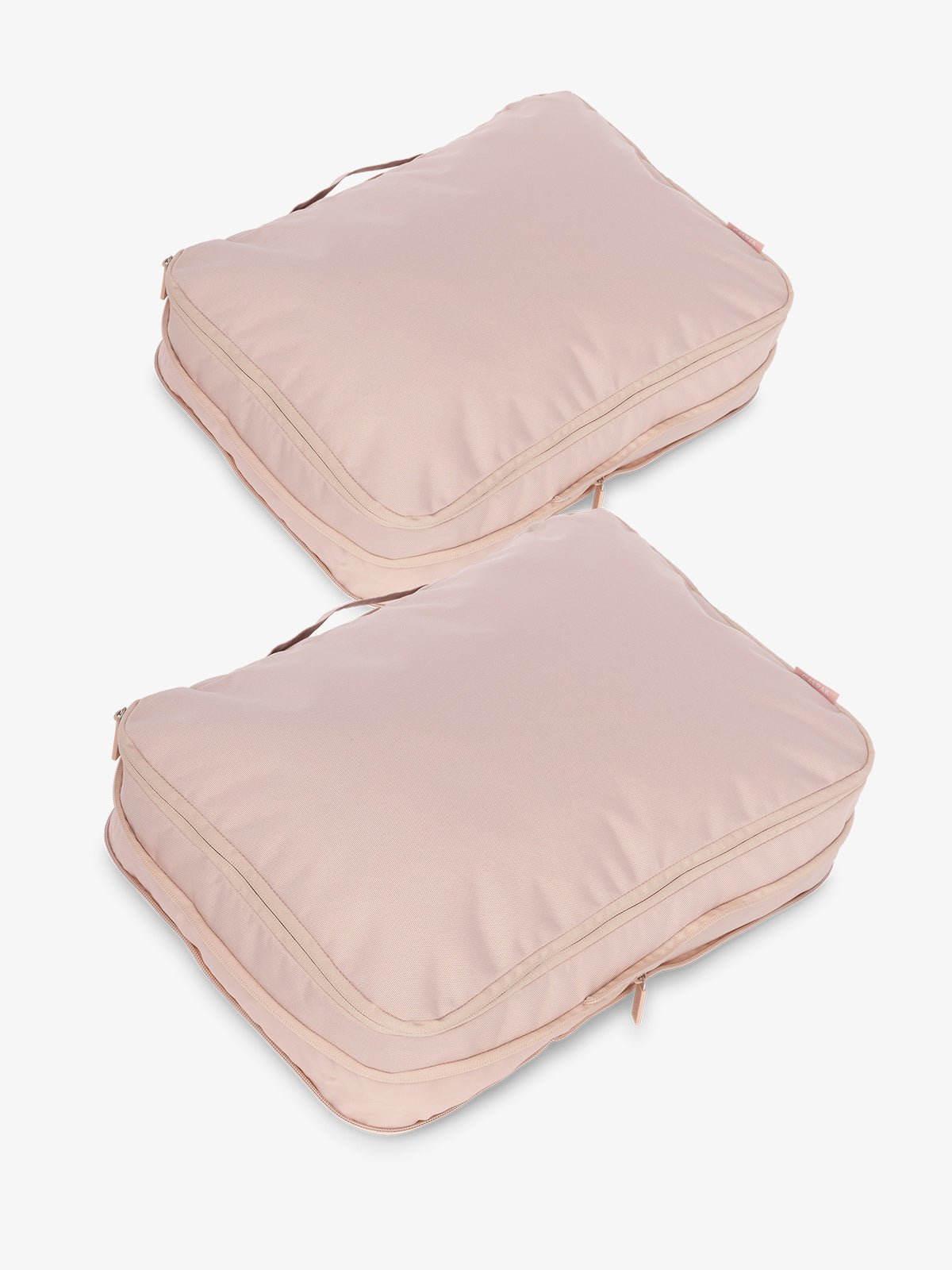 CALPAK large packing cubes with top handles and expandable by 4.5 inches in light pink