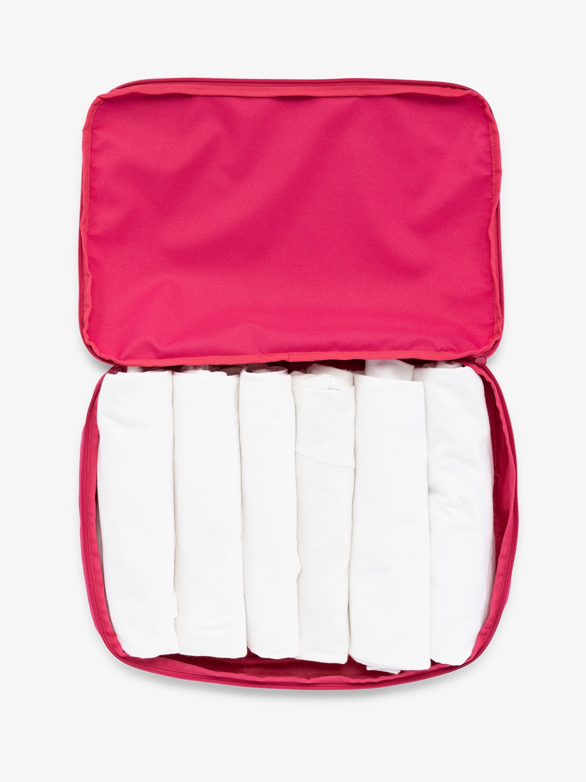 CALPAK large packing cubes for travel made with durable material in dragonfruit