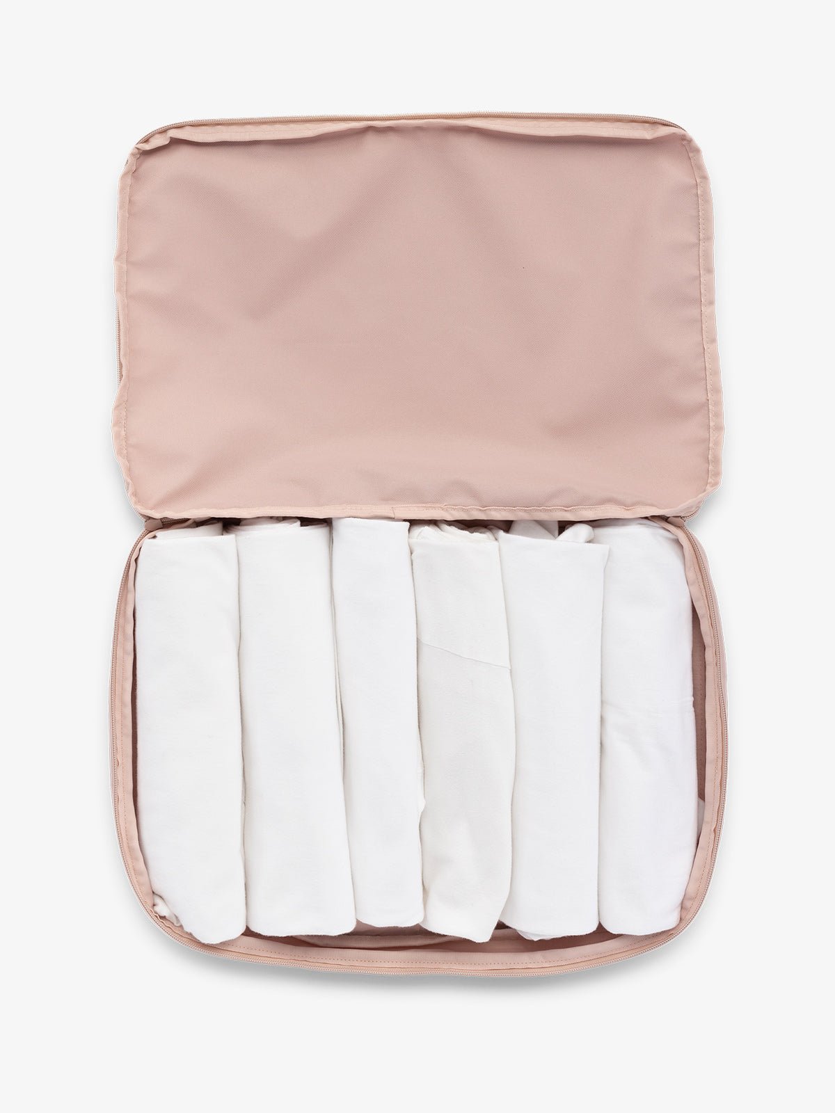 CALPAK large packing cubes for travel made with durable material in pink sand