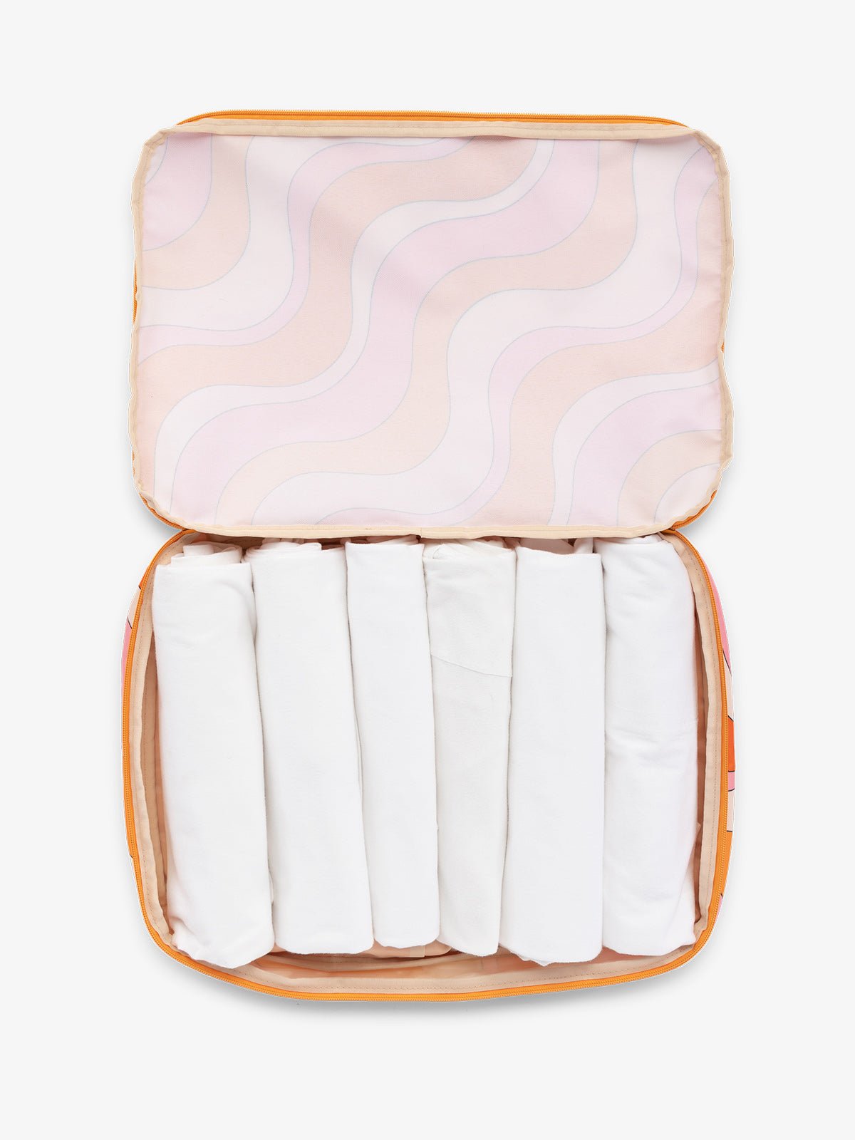 CALPAK Large Compression Packing cubes for travel made with durable materials in retro pink and orange wavy print