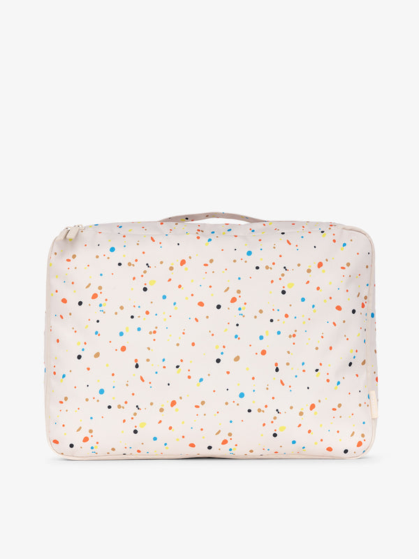 CALPAK large packing cubes with top handle in off-white and multicolored speckle