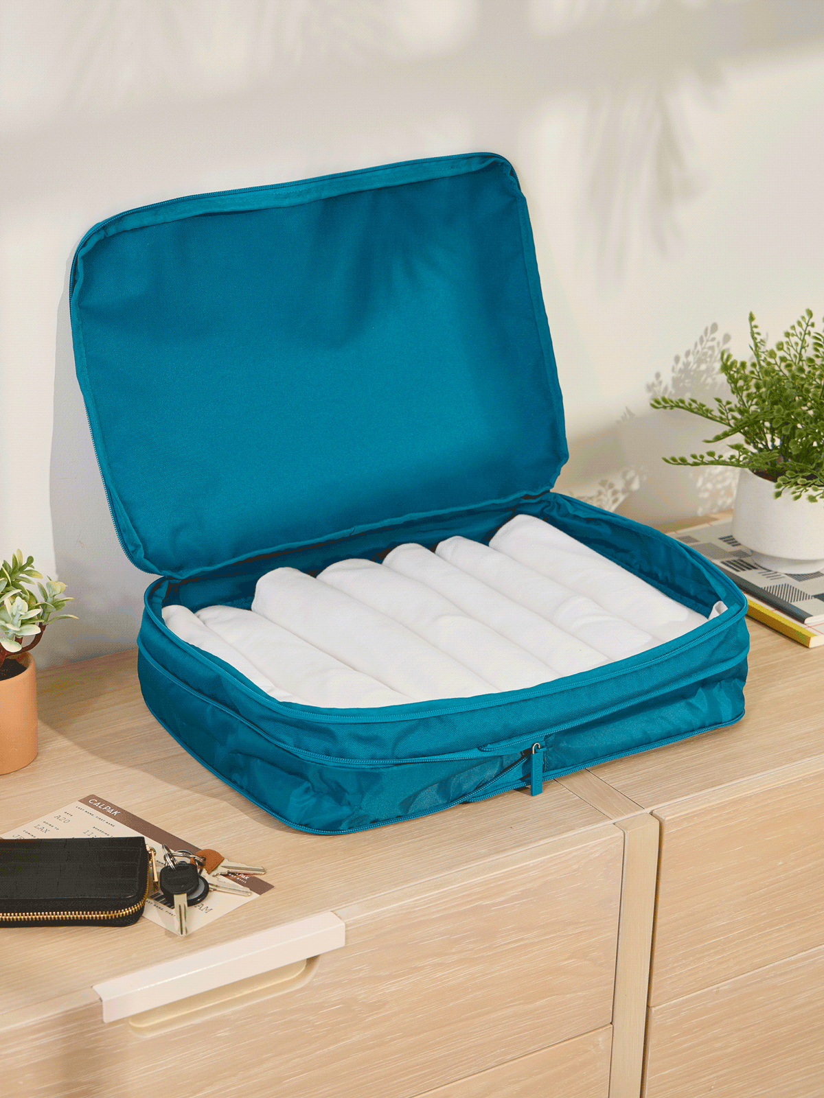 CALPAK Large Compression Packing Cubes made from durable material and expandable by 4.5"