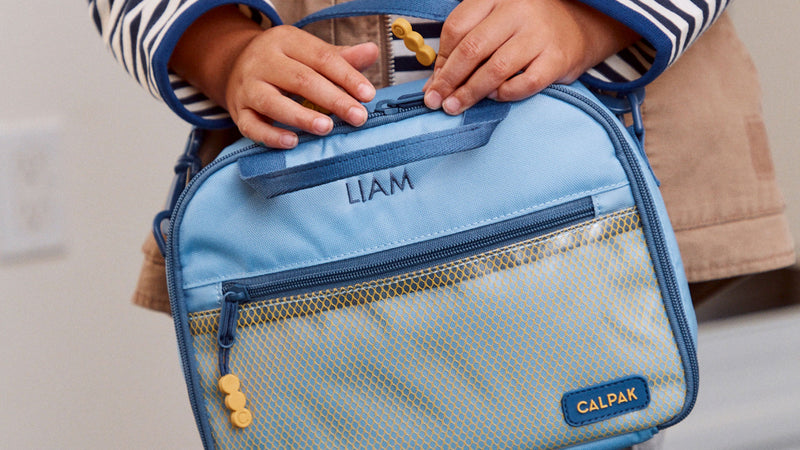 CALPAK Kids Lunch Bag in Blue with Personalization embroidery with name "Liam"