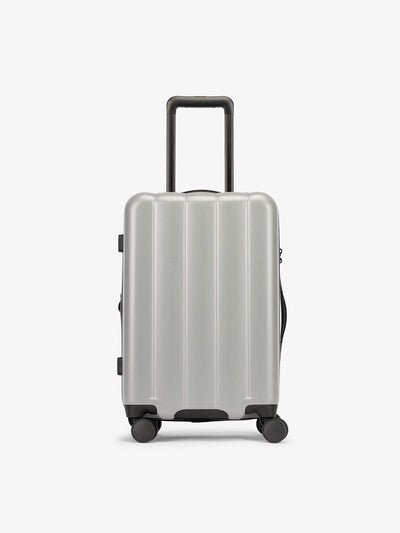 CALPAK Smoke gray carry-on luggage made from an ultra-durable polycarbonate shell and expandable by up to 2; LCO1020-SMOKE view 1
